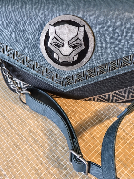 Loungefly Handbags - Loungefly Black Panther Emblem Teal Crossbody Bag -